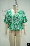 Cropped flutter‑sleeve printed blouse