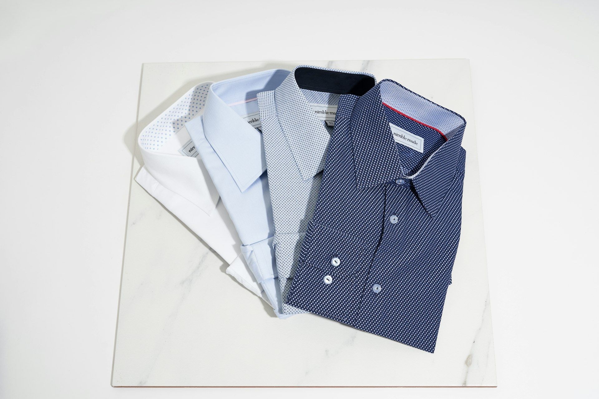 Folded shirting laid out for inspection