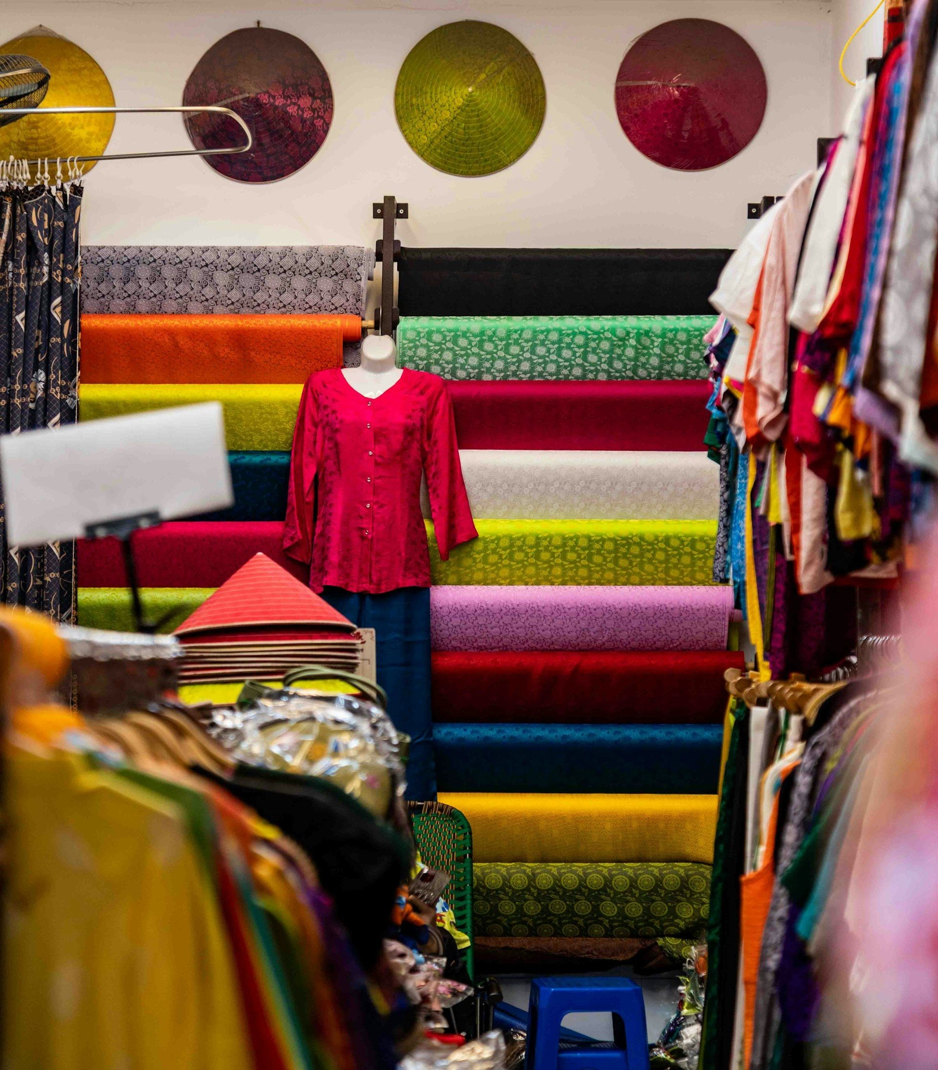 A fabric trading unit stocked with cloth and finished garments