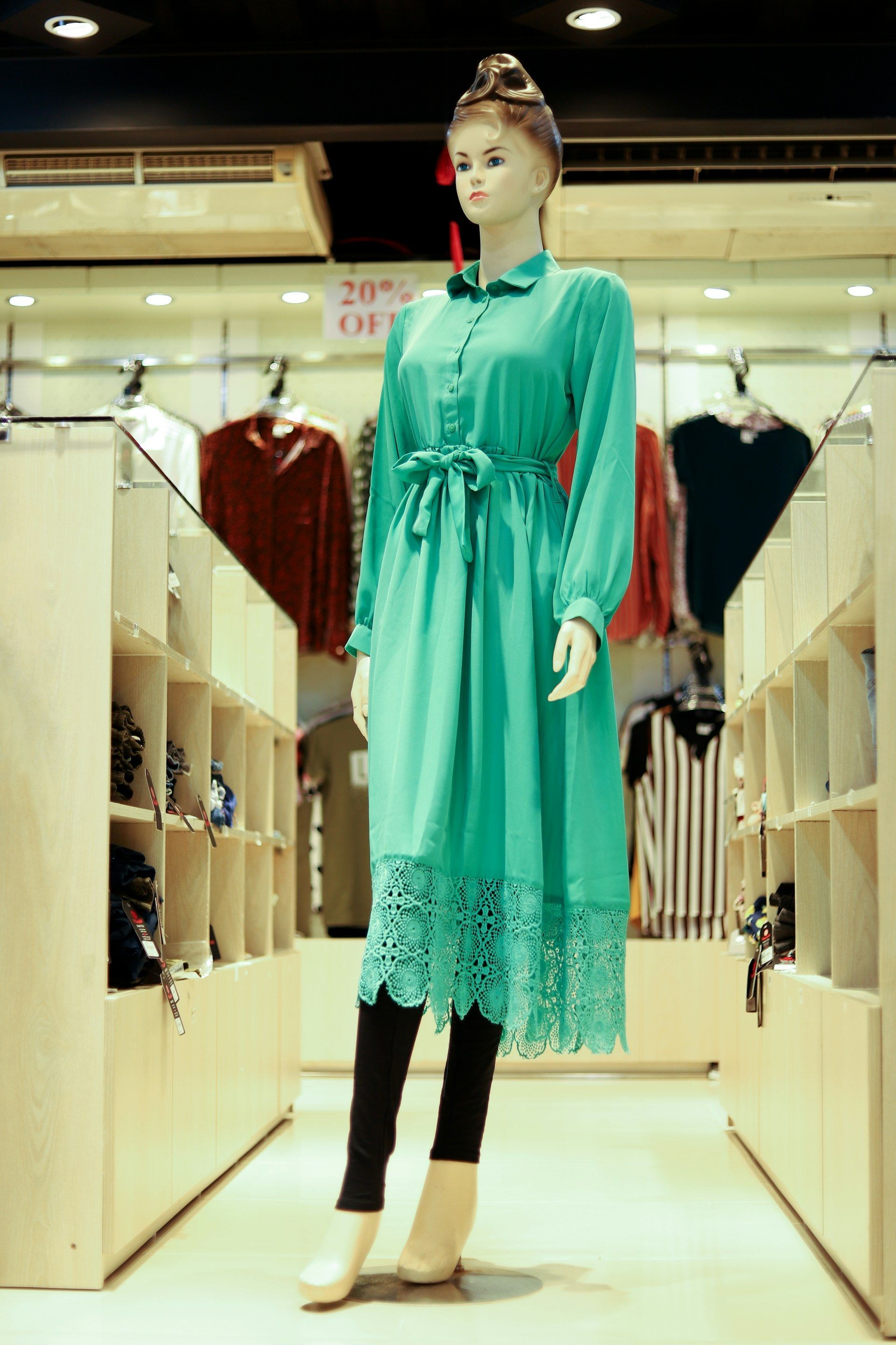 A dressed mannequin in a womenswear unit