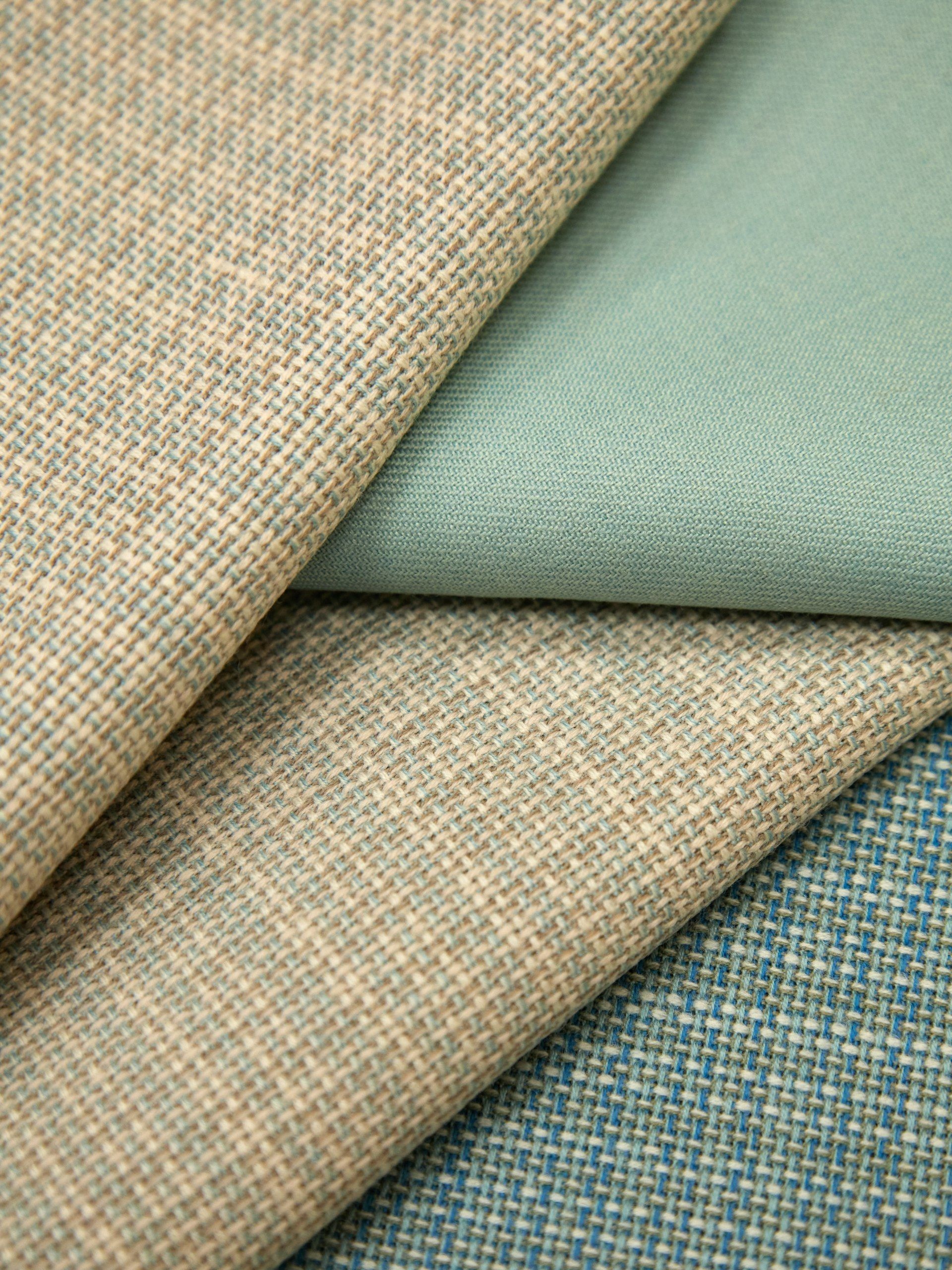 Fine cloth folded to show weave and drape