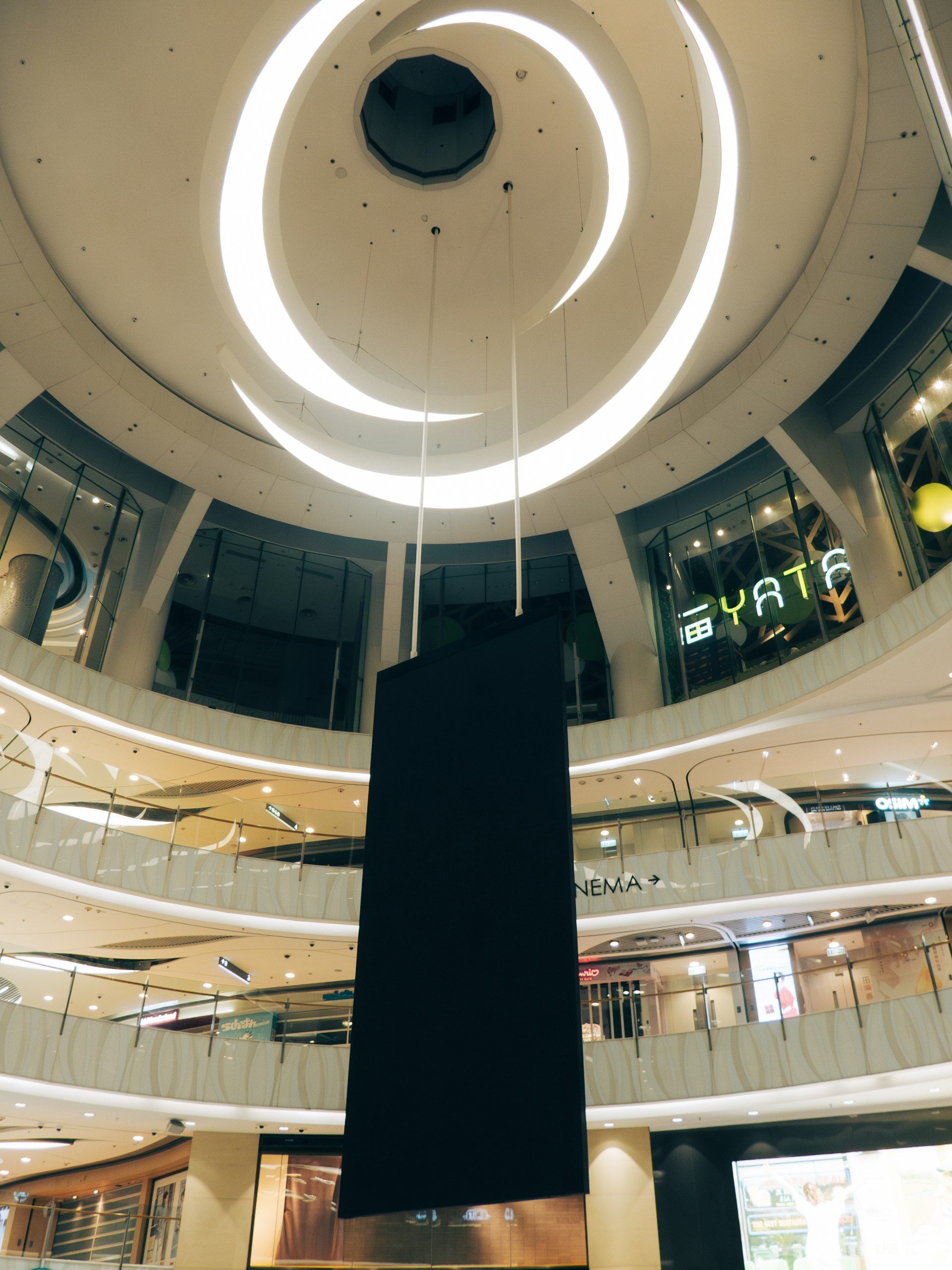 A lit display area inside a modern fashion centre