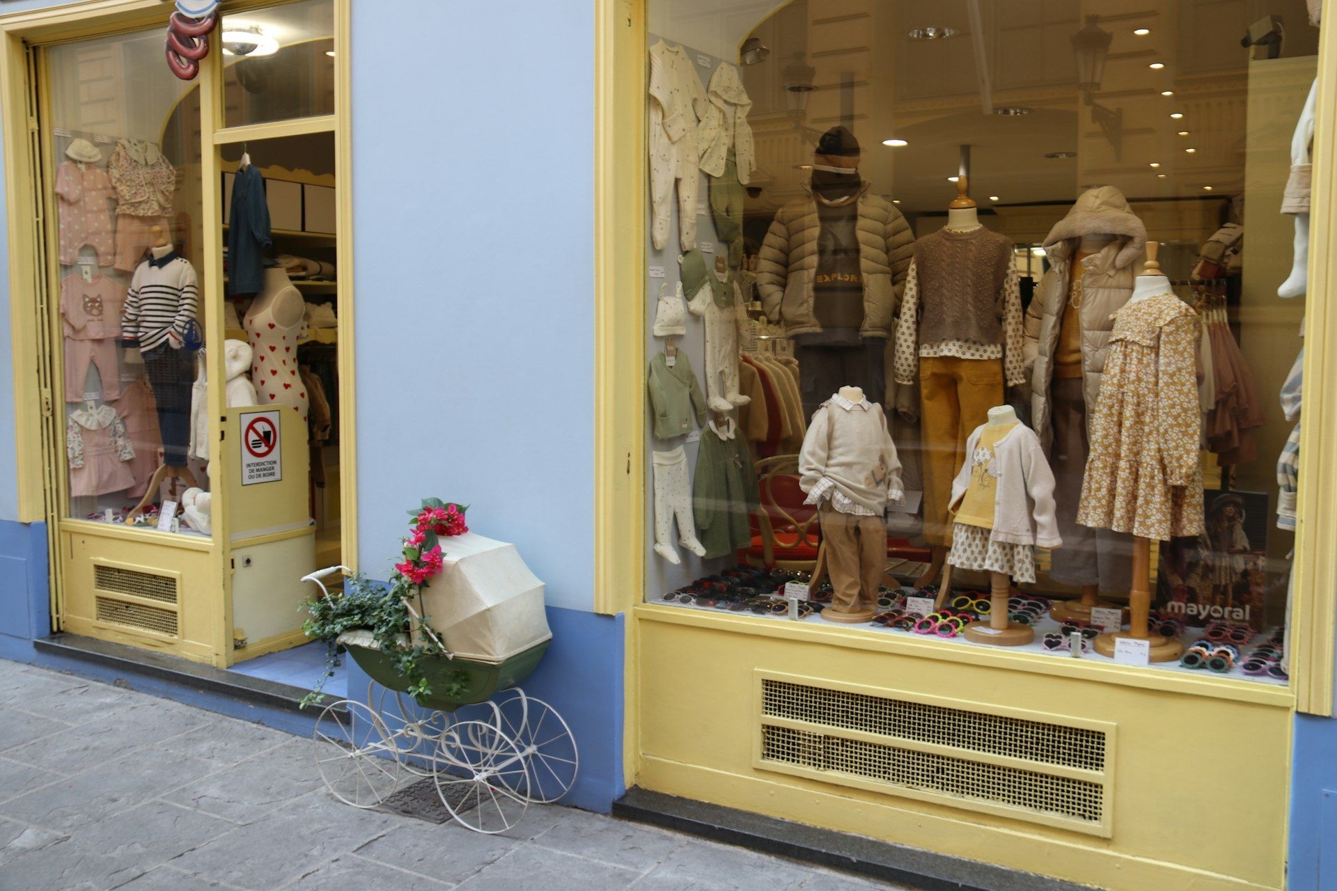 Shop window display with dressed mannequins