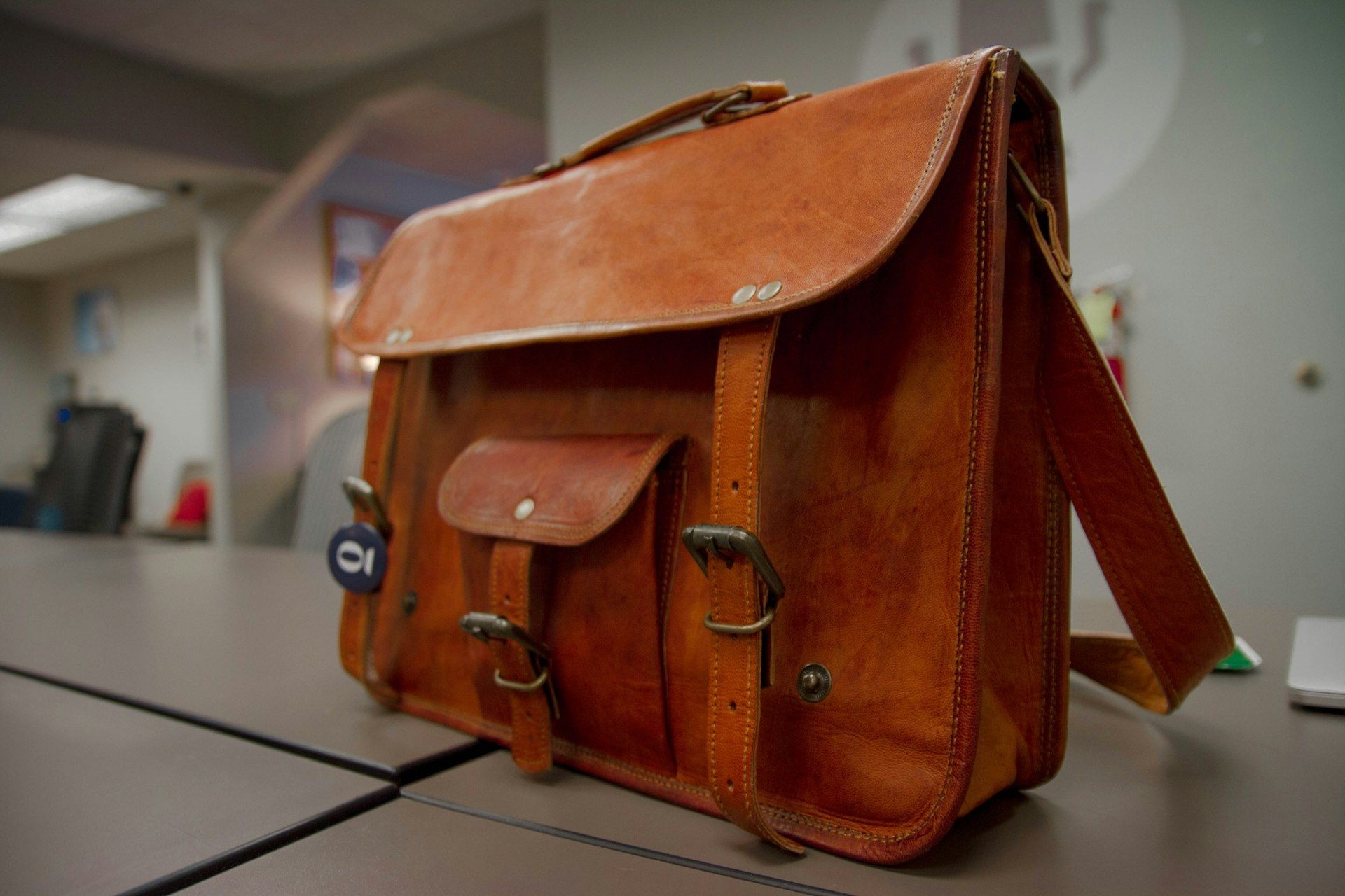 Close view of a leather crossbody bag