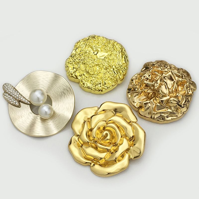 Large irregular shaped button with ruffled flower design