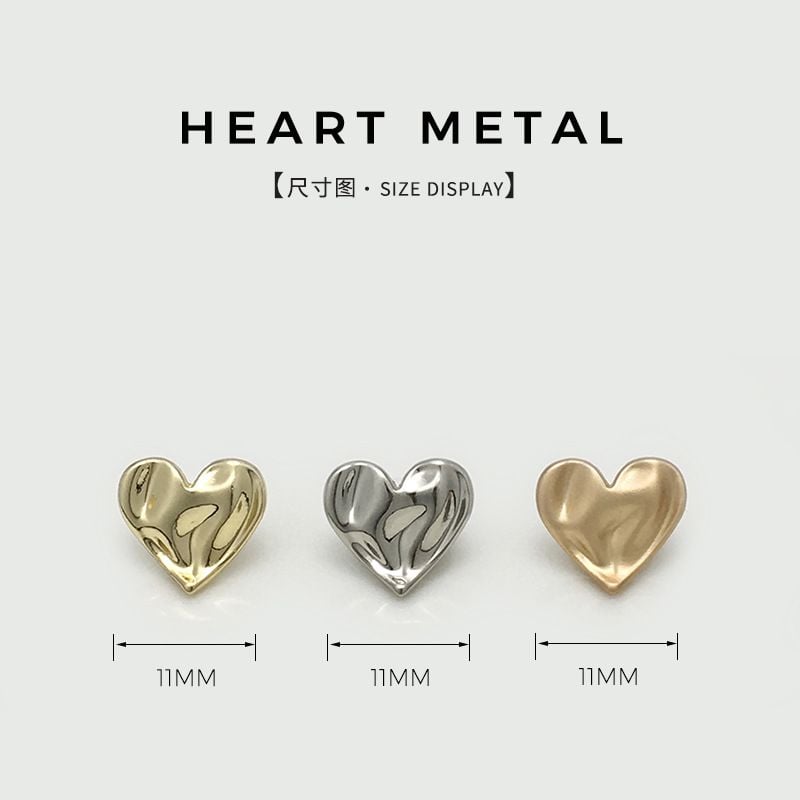 Embossed heart-shaped metal button