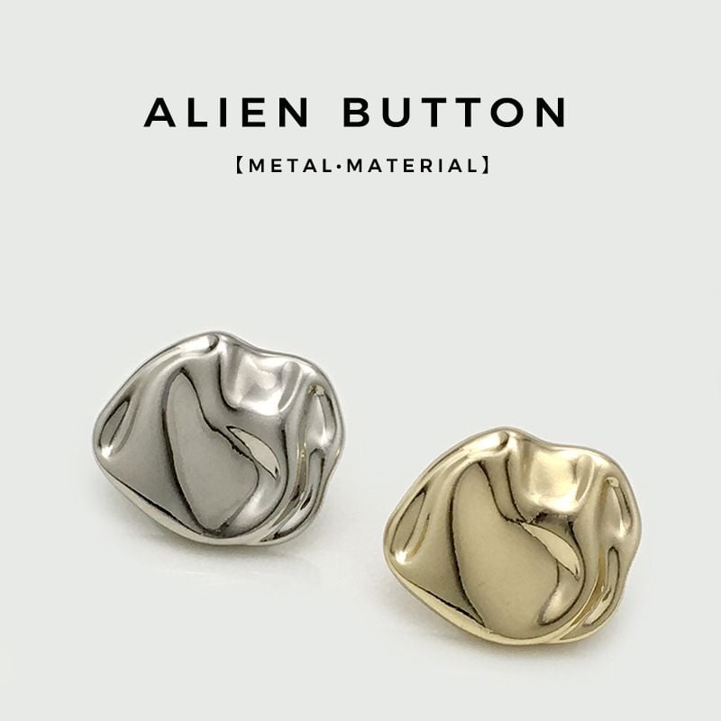 Vintage irregular metal buttons with uneven texture