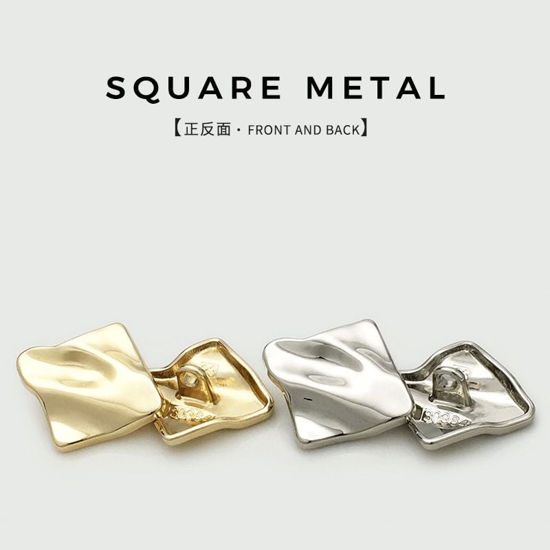 Irregular wrinkled square metal button with textured surface