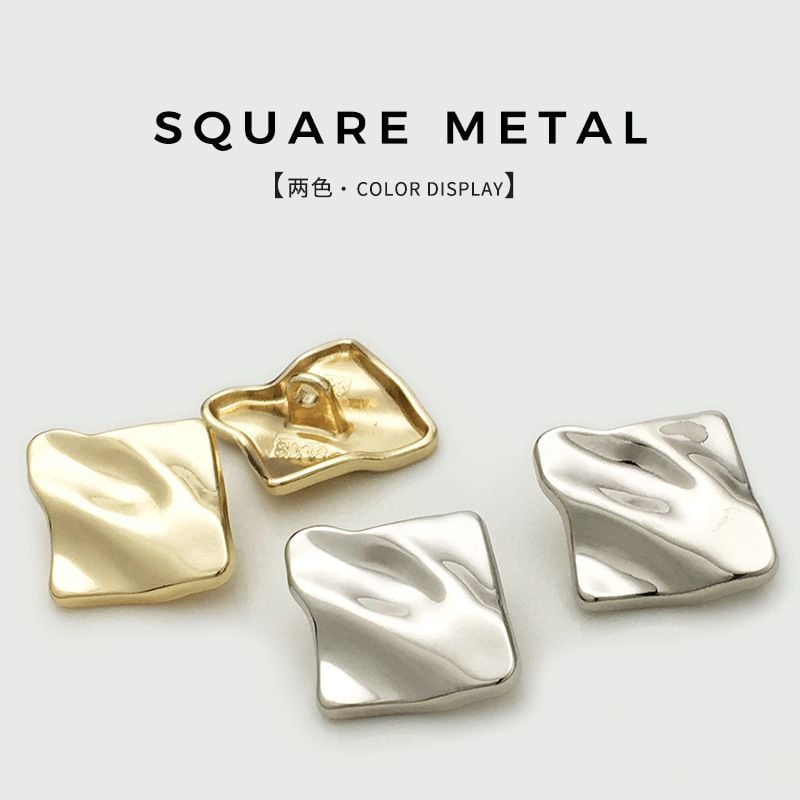 Irregular wrinkled square metal button with textured surface