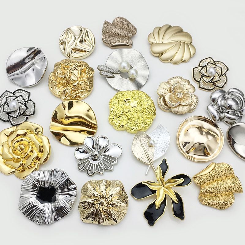 Large irregular shaped button with ruffled flower design