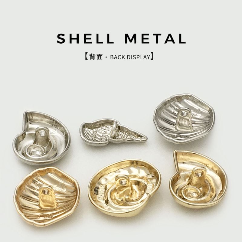 Stylish irregular shell-shaped metal button with ocean vibe