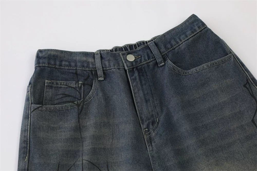Men's loose casual denim shorts with trendy spider print