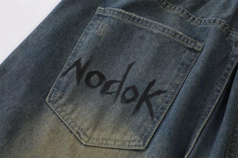 Men's loose casual denim shorts with trendy spider print