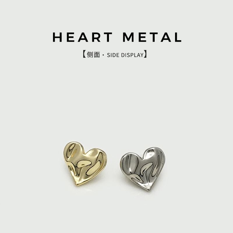 Embossed heart-shaped metal button
